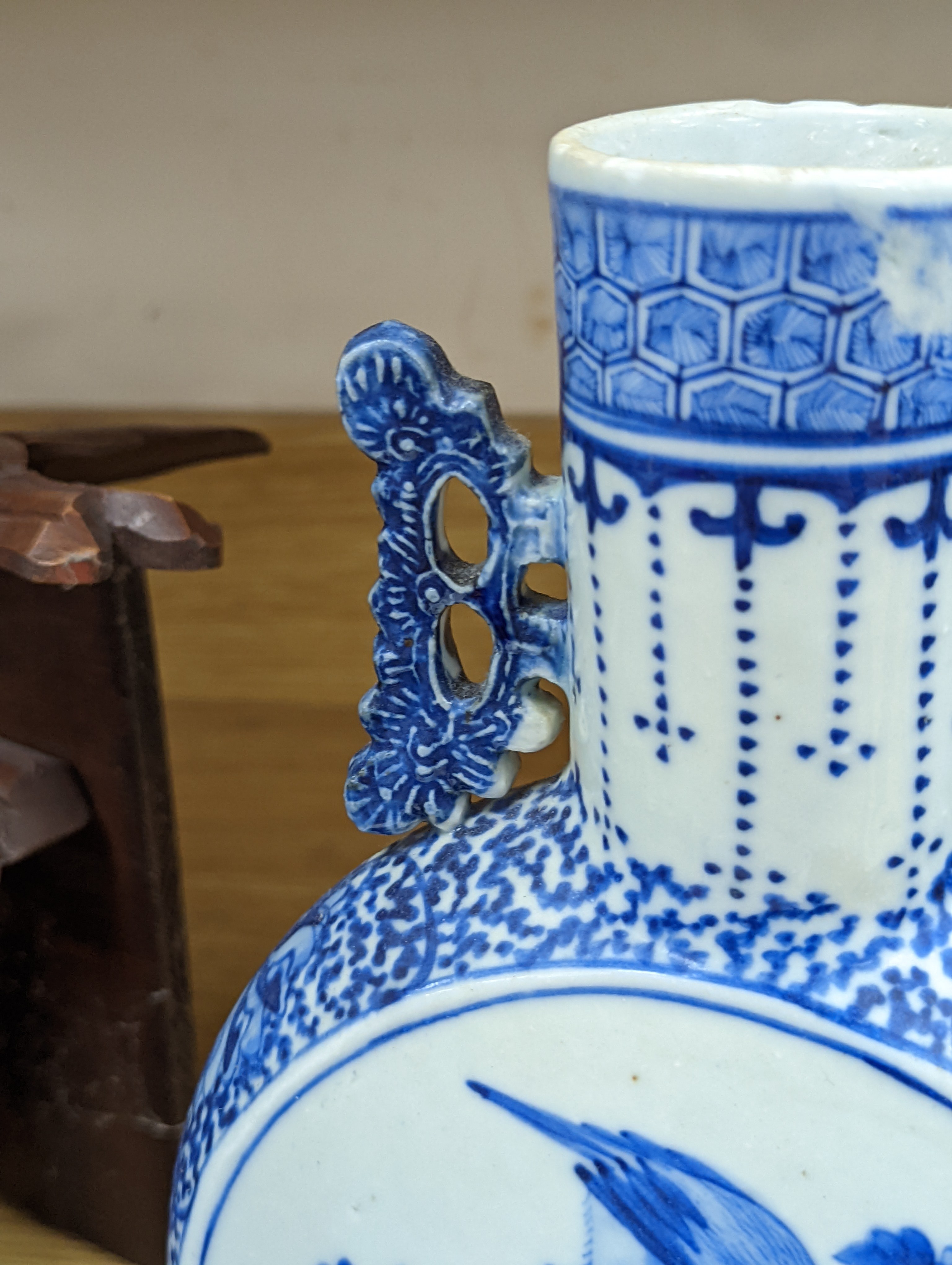 Three 19th century Chinese blue and white Moon flasks, tallest 31 cms.